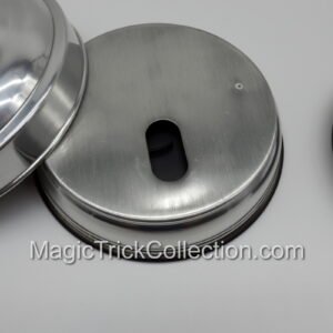 Rings-N-Things Fire to Dove Pan, classic magic at its best. Magician lights an empty pan on fire, covers it quickly and upon lifting the lid a dove appears. 