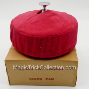 Rings-N-Things Chick Pan is a highly collectible, vintage piece of magic apparatus used by magicians to seamlessly vanish or produce small objects.